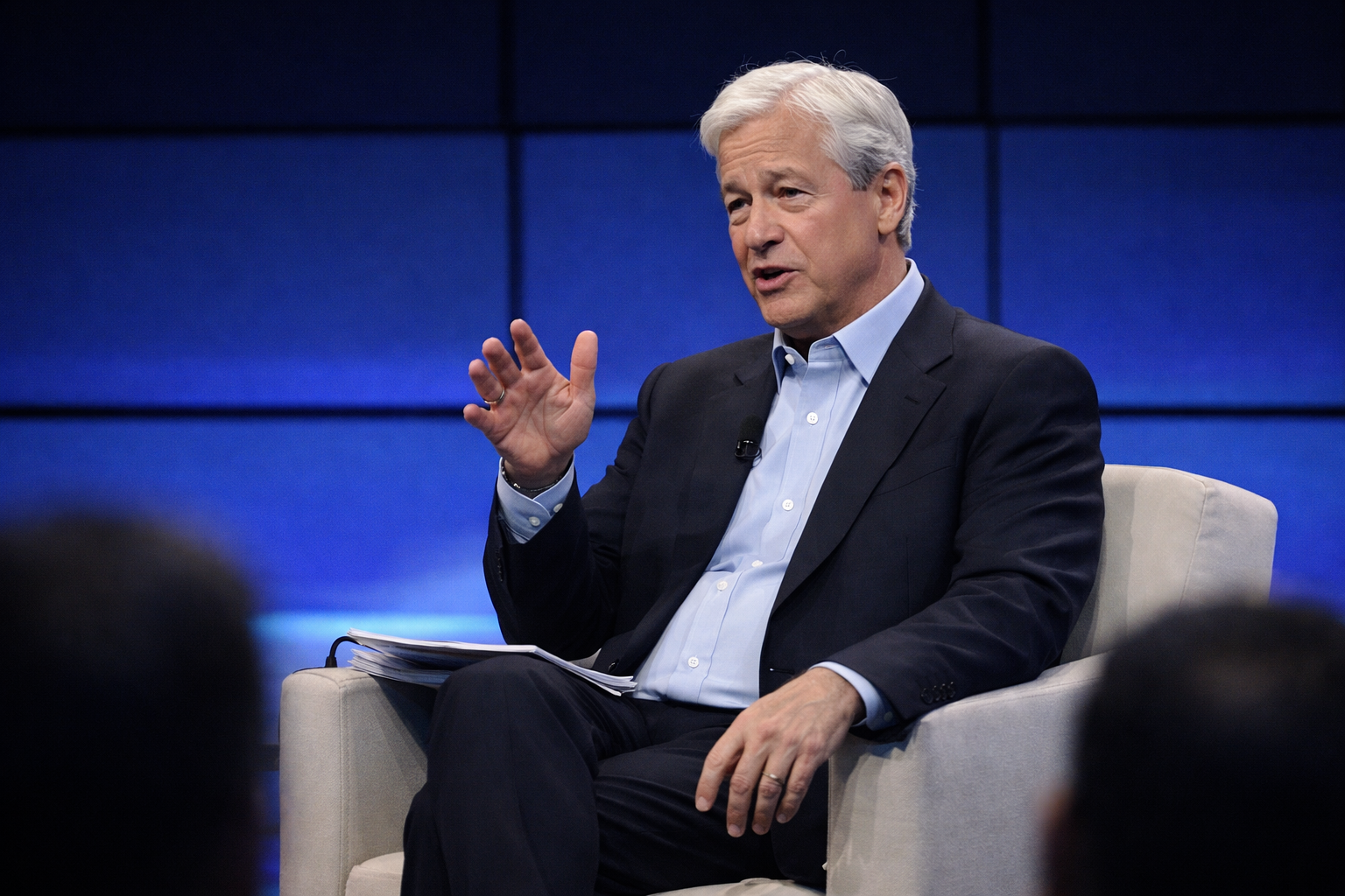 Jamie Dimon warns of bond market risks as rising debt, inflation and geopolitics test global financial stability.