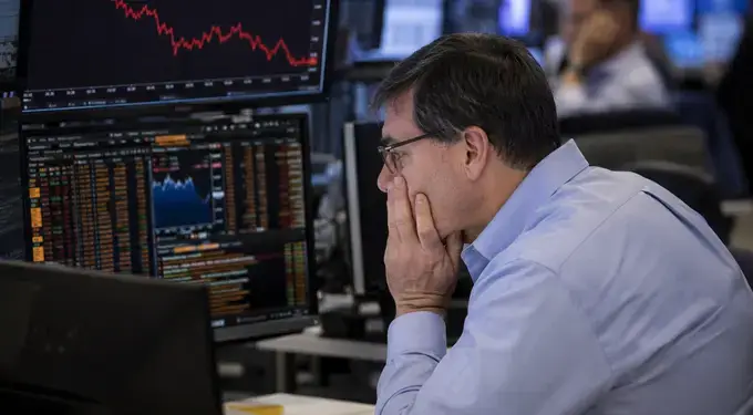 Investor looking at stocks screen