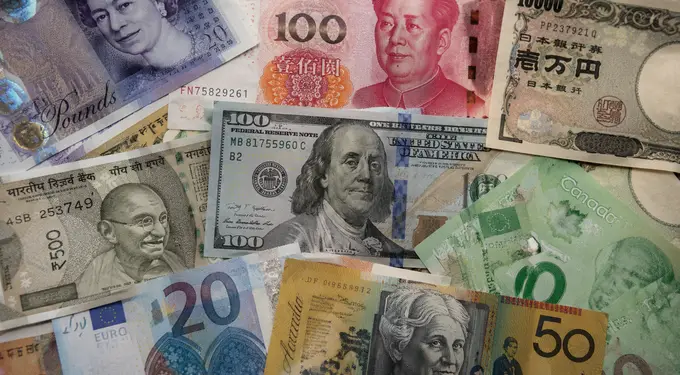 Forex markets turn cautious as oil surges on Middle East risks
