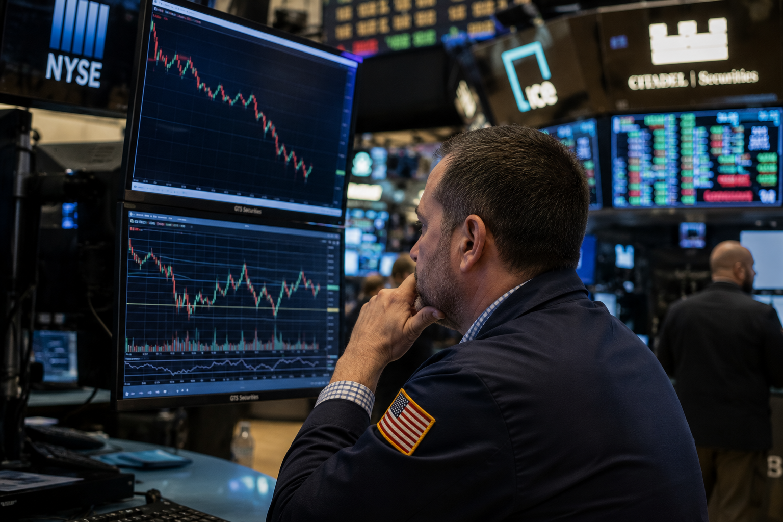 An investor looking at stock market charts