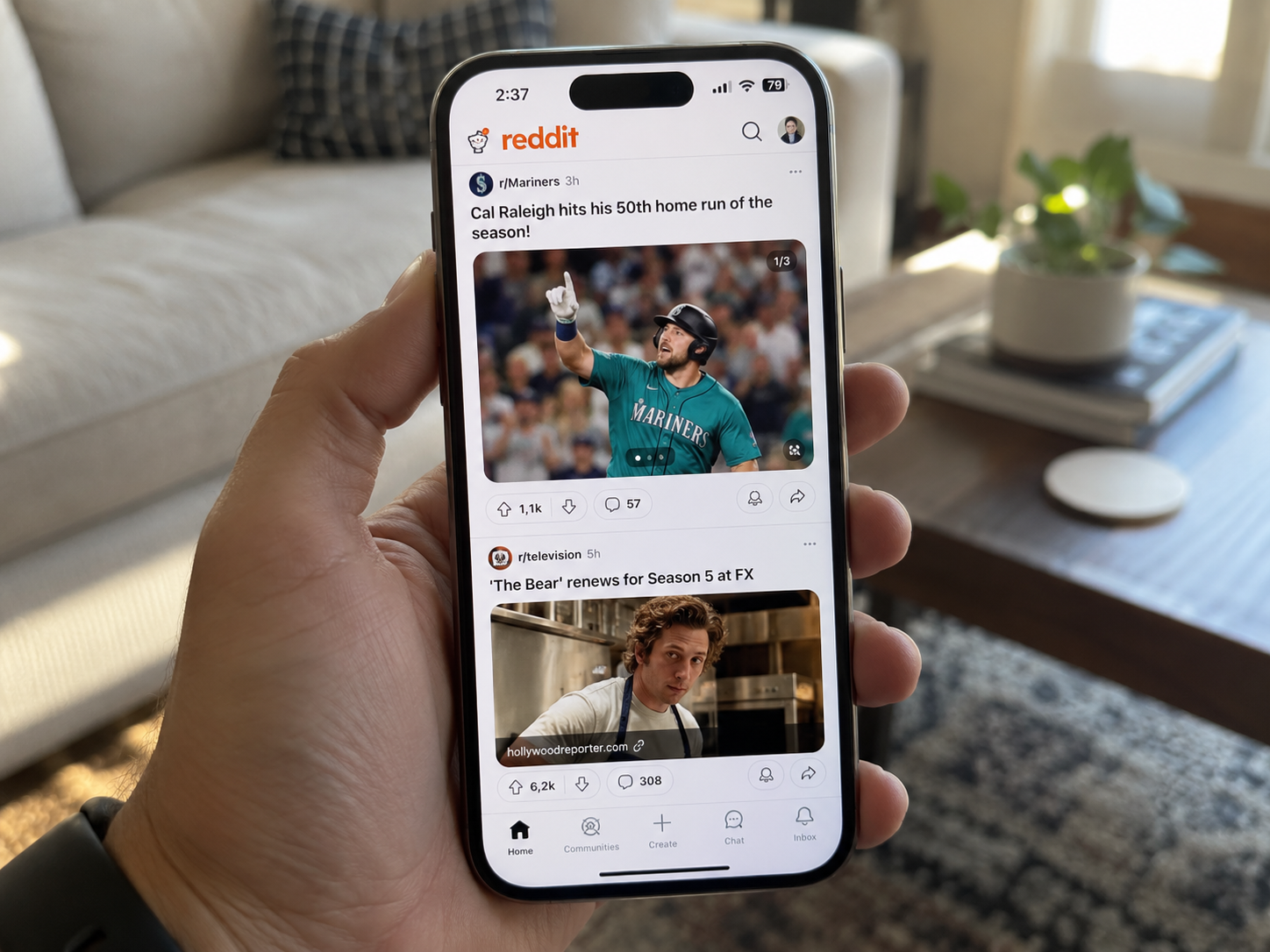A person using reddit app on their phone